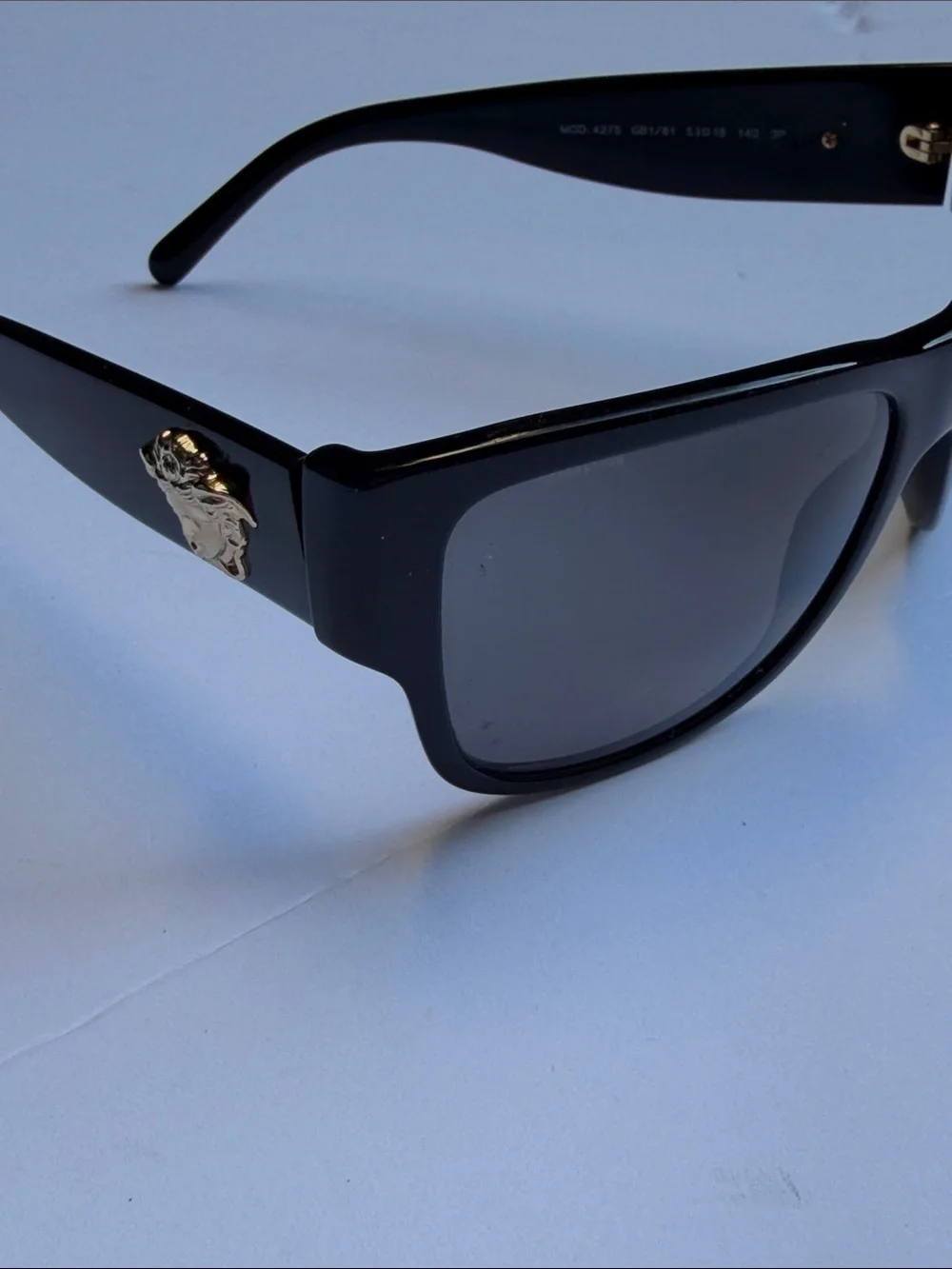 Versace questions leave